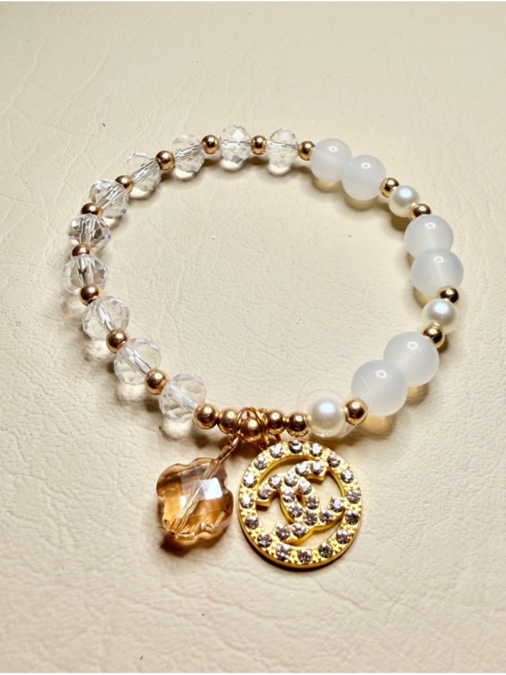 CC Gold-Tone and amber Crystal & White Bead Bracelet with Pendant